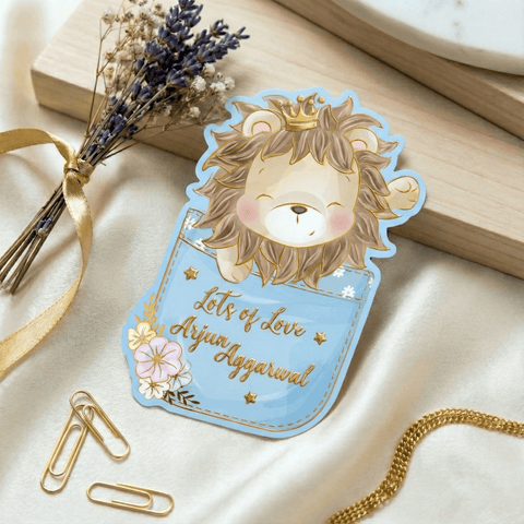 Gift tag  with a lion illustration and text with gold embossing with decorative elements.