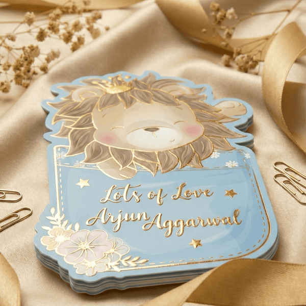 Gift tag  with a lion illustration and text with gold embossing